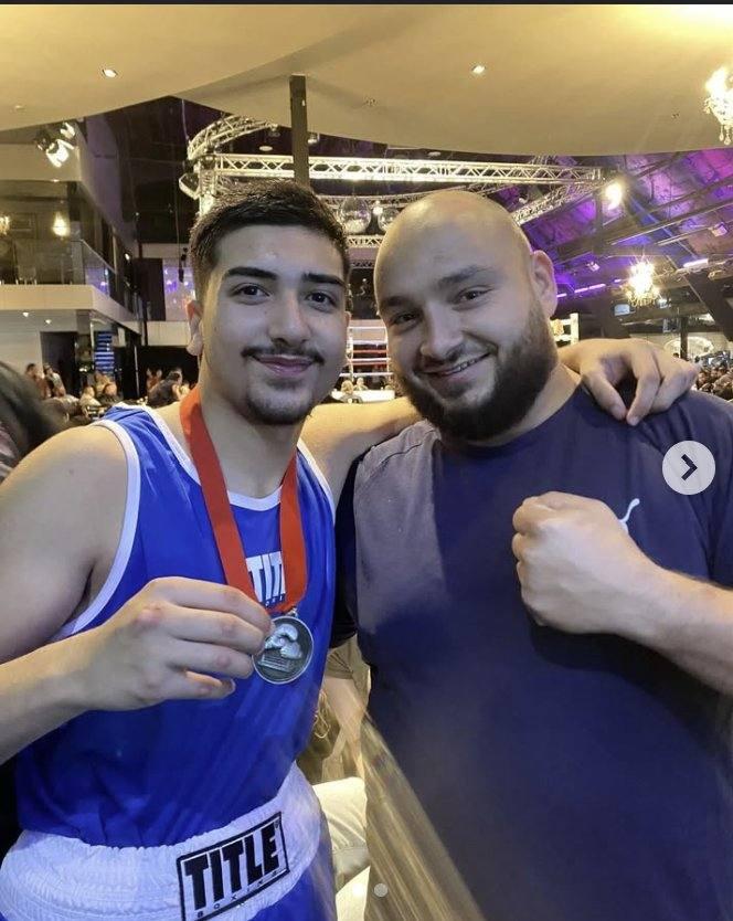 Fighter with his competition medal