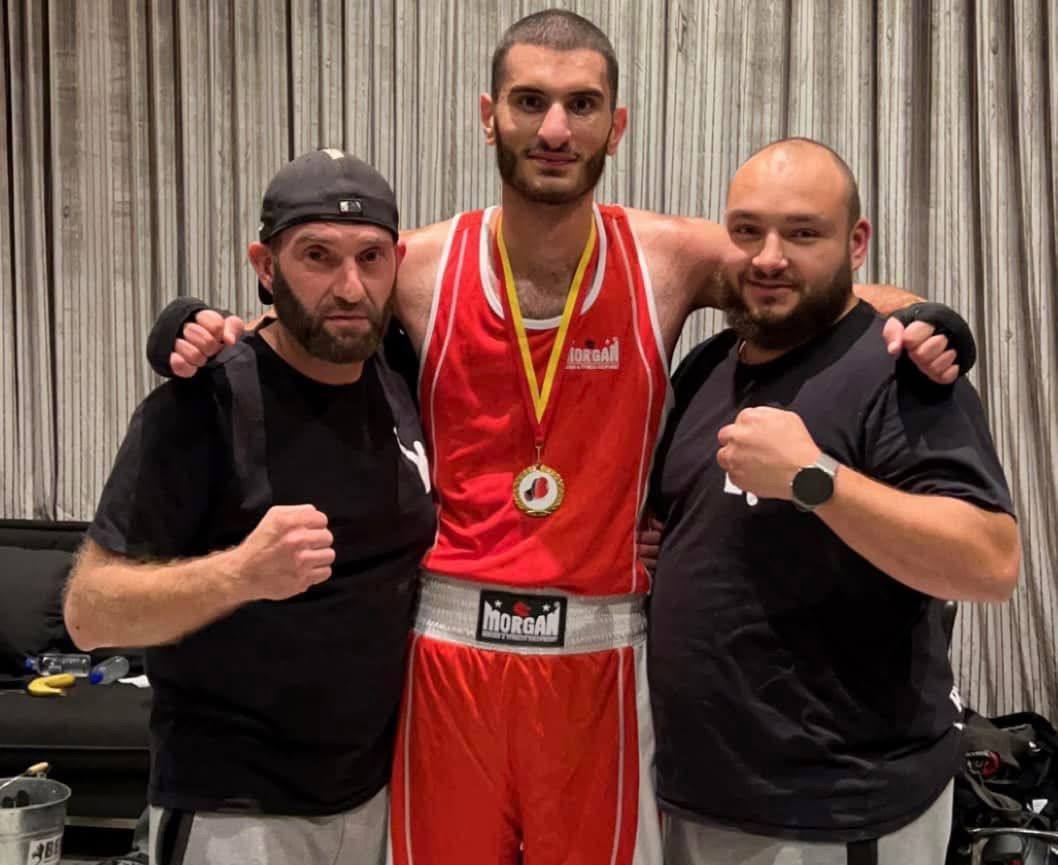 Moussa with a fighter after a win